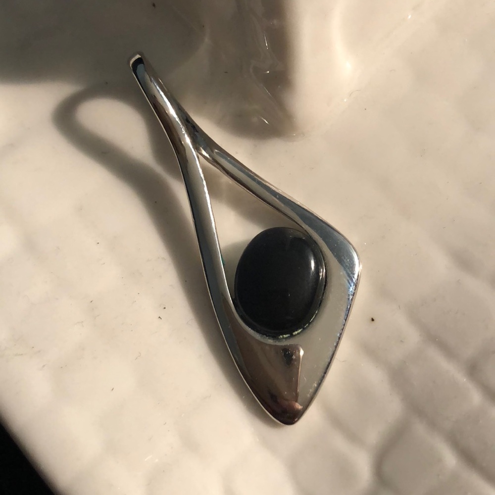 Black and silver pendant